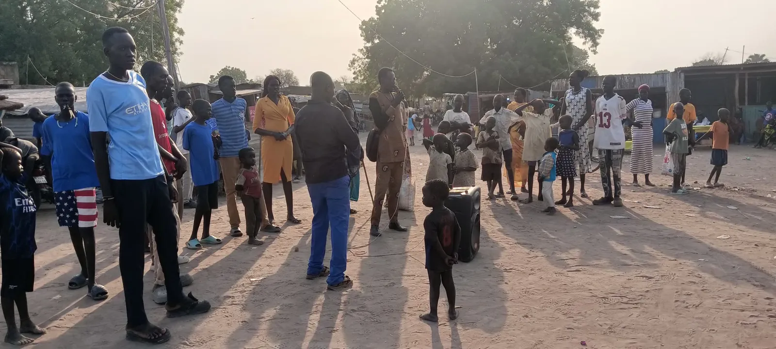 An outdoor evening crusade gathering in South Sudan